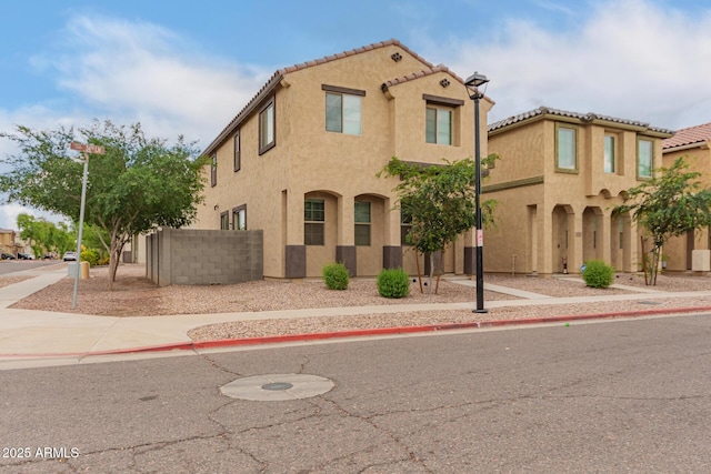 3713 S 54th Ln, Phoenix, AZ 85043 - view of front of property featuring stucco siding, fence, and a tiled roof
