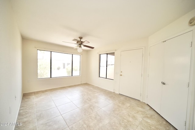 empty room with ceiling fan