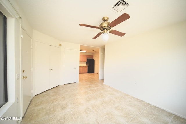 empty room with ceiling fan