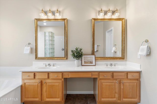 full bath featuring double vanity, a garden tub, and a sink