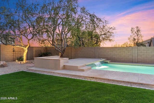 view of swimming pool featuring a patio area, a fenced backyard, a fenced in pool, and a yard