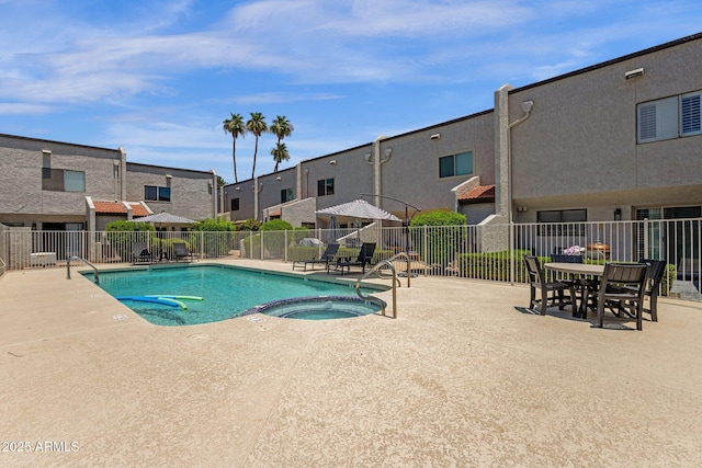 4918 N 74th St, Scottsdale, AZ 85251 - view of pool with a patio, a residential view, and a pool with connected hot tub