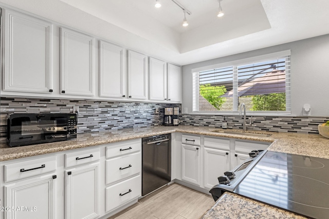4918 N 74th St, Scottsdale, AZ 85251 - kitchen featuring black dishwasher, electric stove, tasteful backsplash, and white cabinets