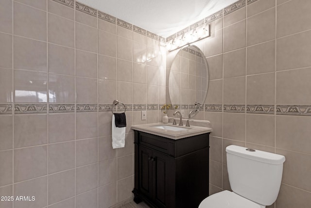 4918 N 74th St, Scottsdale, AZ 85251 - half bathroom featuring tile walls and vanity