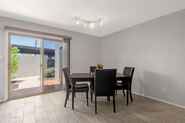 4918 N 74th St, Scottsdale, AZ 85251 - dining area featuring wood tiled floors