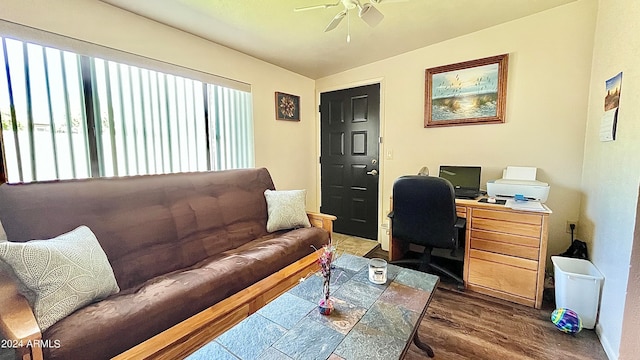 office with ceiling fan, lofted ceiling, and dark wood-type flooring