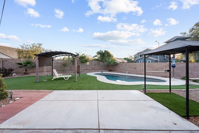 view of swimming pool featuring a pergola, a patio, and a yard