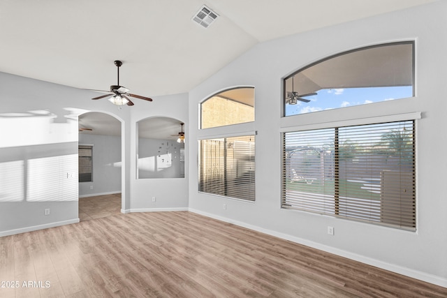 interior space with lofted ceiling and light hardwood / wood-style floors