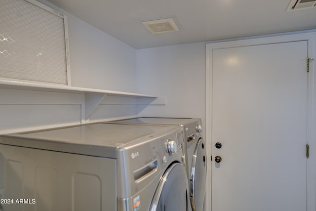 laundry area with washer and dryer