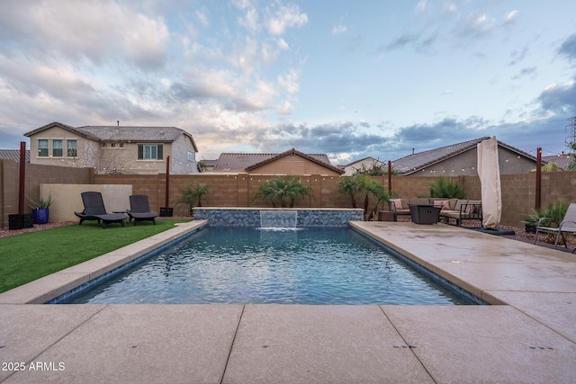 view of swimming pool with a fenced in pool, a patio, and a fenced backyard