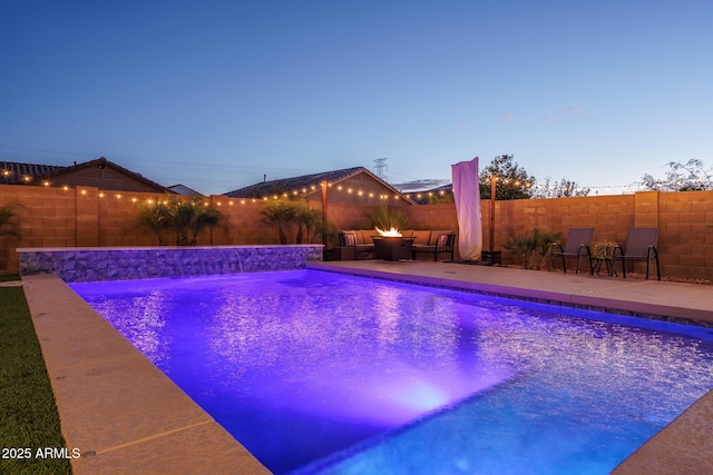 view of swimming pool with a patio area, a fenced backyard, and a fenced in pool