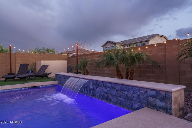 view of pool featuring a fenced in pool and a fenced backyard