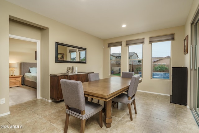 dining room featuring light tile patterned floors, recessed lighting, and baseboards