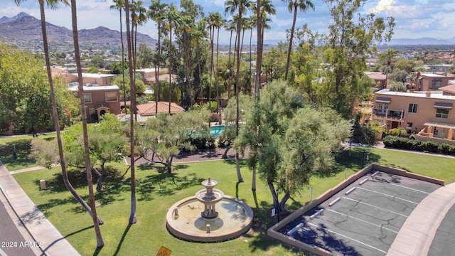 birds eye view of property featuring a mountain view