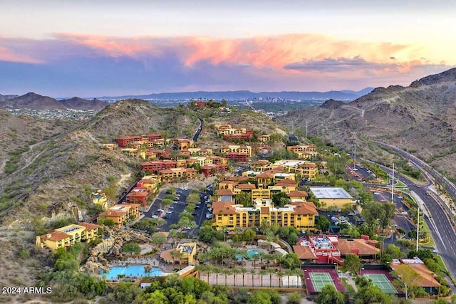 aerial view at dusk with a mountain view