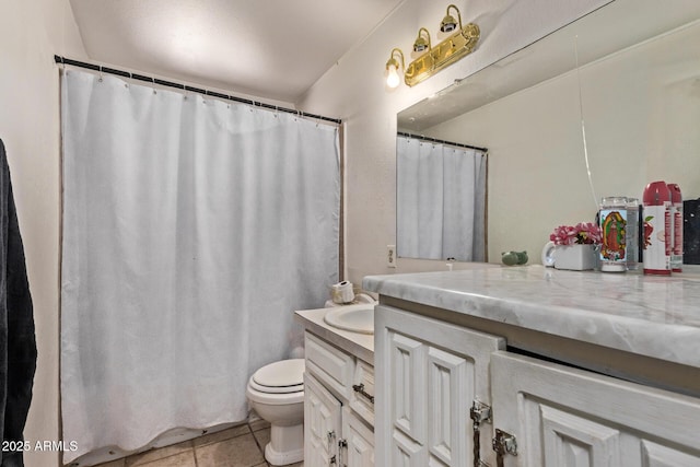 full bath with vanity, tile patterned flooring, and toilet