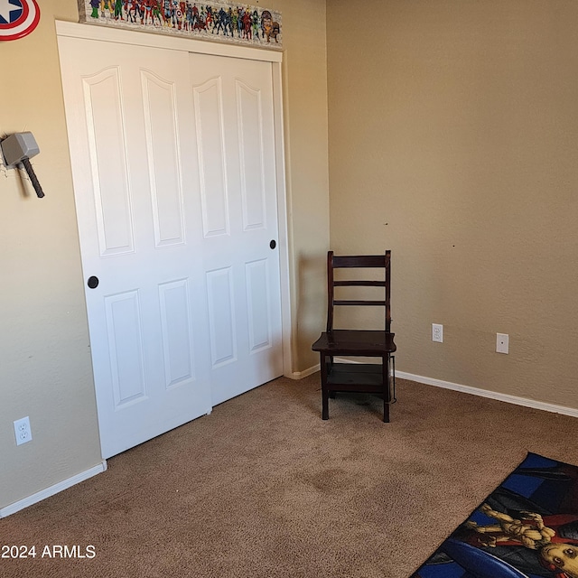 living area with carpet