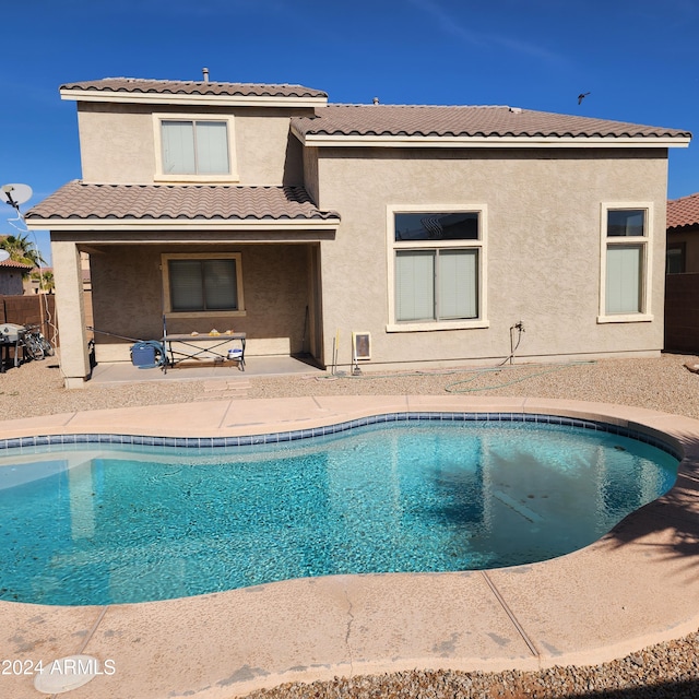 back of house featuring a patio area