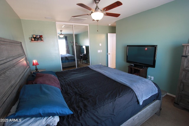 2434 E San Manuel Rd, San Tan Valley, AZ 85143 - carpeted bedroom featuring attic access, a closet, baseboards, and a ceiling fan