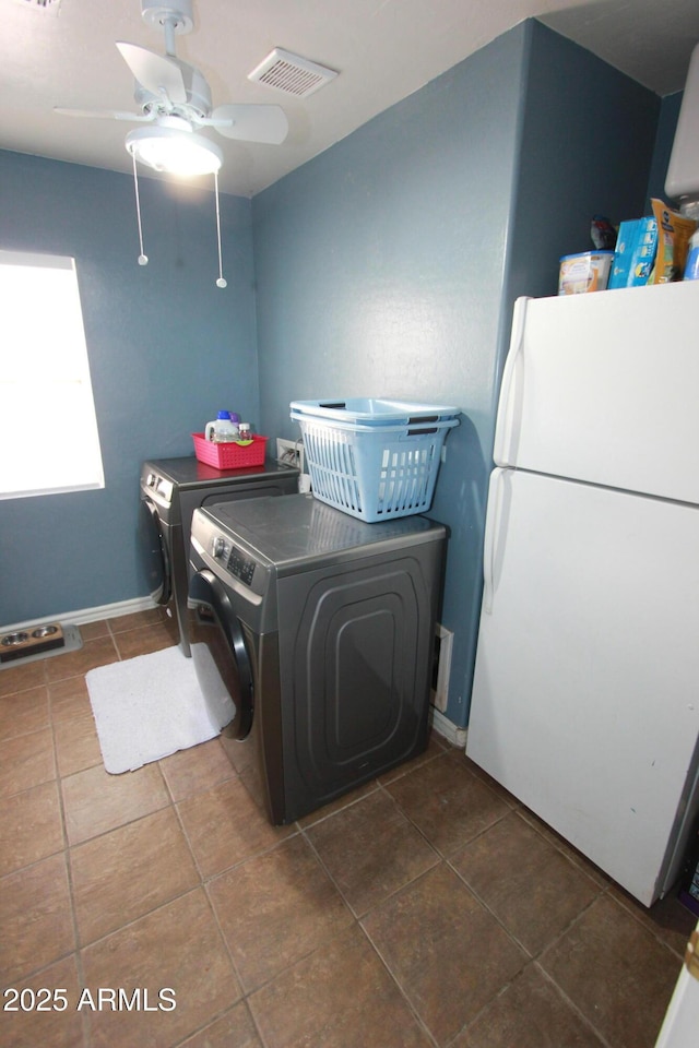 2434 E San Manuel Rd, San Tan Valley, AZ 85143 - washroom with a ceiling fan, separate washer and dryer, laundry area, tile patterned floors, and visible vents