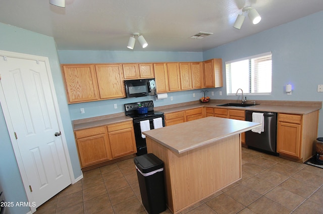 2434 E San Manuel Rd, San Tan Valley, AZ 85143 - kitchen featuring a sink, dark tile patterned floors, black appliances, visible vents, and light countertops