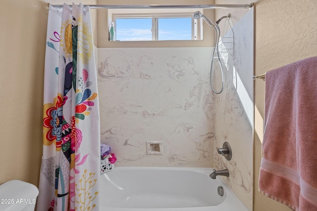 full bath featuring toilet and shower / tub combo