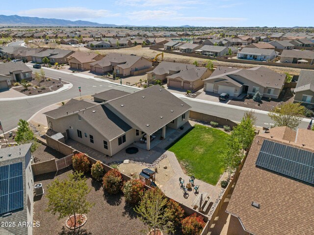 birds eye view of property with a residential view and a mountain view