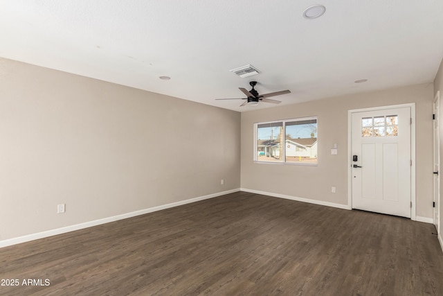 entrance foyer featuring ceiling fan and dark wood-type flooring