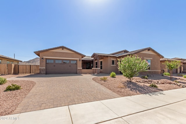 ranch-style house featuring a garage