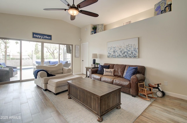 12041 S 45th St, Phoenix, AZ 85044 - living area featuring baseboards, a ceiling fan, light wood-style floors, visible vents, and high vaulted ceiling