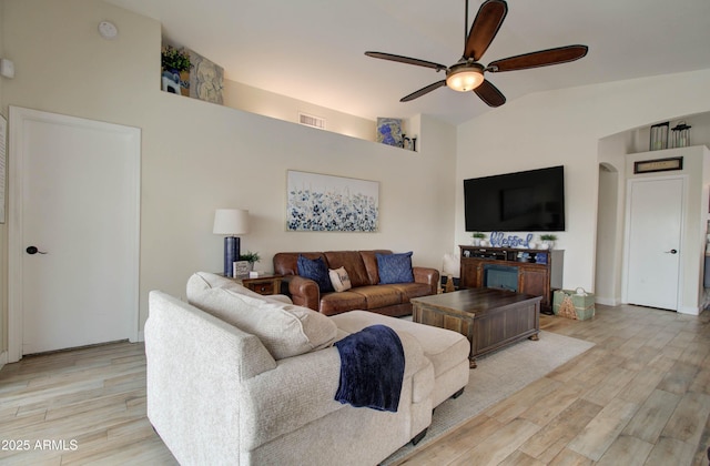 12041 S 45th St, Phoenix, AZ 85044 - living area with light wood-type flooring, vaulted ceiling, a ceiling fan, and visible vents