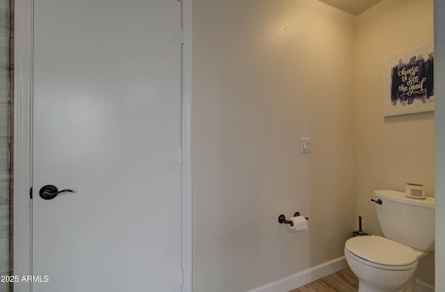 12041 S 45th St, Phoenix, AZ 85044 - bathroom with toilet, wood finished floors, and baseboards