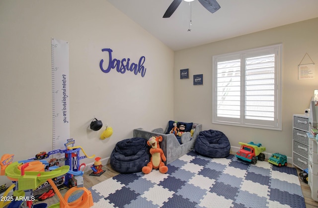 12041 S 45th St, Phoenix, AZ 85044 - rec room with baseboards, a ceiling fan, and wood finished floors