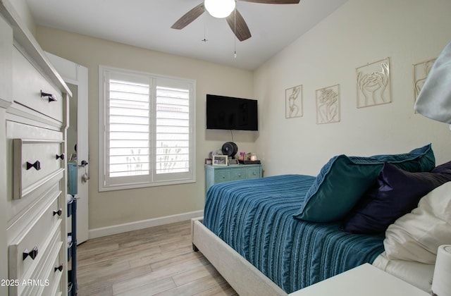 12041 S 45th St, Phoenix, AZ 85044 - bedroom with multiple windows, light wood-type flooring, baseboards, and ceiling fan