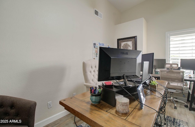 12041 S 45th St, Phoenix, AZ 85044 - office space with visible vents, baseboards, and wood finished floors