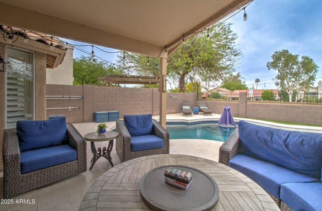 12041 S 45th St, Phoenix, AZ 85044 - view of patio / terrace with a fenced in pool, outdoor lounge area, a fenced backyard, and outdoor dining space