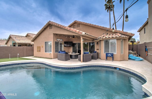 12041 S 45th St, Phoenix, AZ 85044 - back of property with outdoor lounge area, a fenced backyard, stucco siding, a patio, and a tile roof