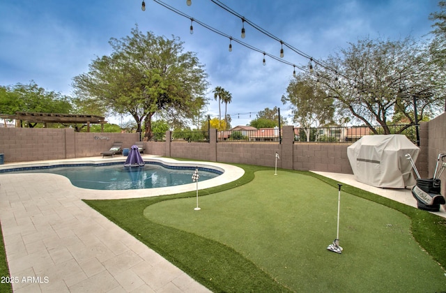 12041 S 45th St, Phoenix, AZ 85044 - view of swimming pool with a fenced in pool, a patio area, a fenced backyard, and area for grilling