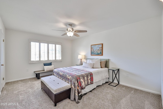 bedroom featuring light carpet, ceiling fan, and baseboards