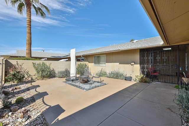 view of patio / terrace featuring fence