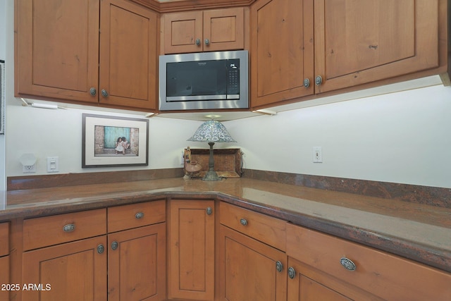 kitchen featuring stainless steel microwave