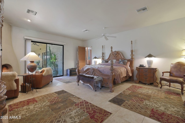 bedroom featuring light tile patterned flooring, ceiling fan, and access to exterior