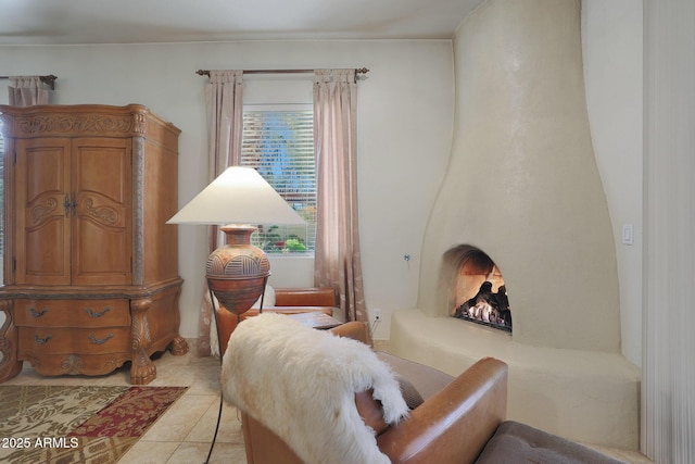 sitting room with light tile patterned flooring