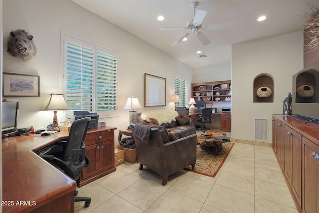 home office with ceiling fan and light tile patterned flooring