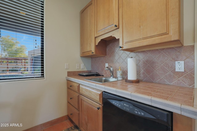 kitchen with dishwasher, light brown cabinetry, sink, backsplash, and tile countertops