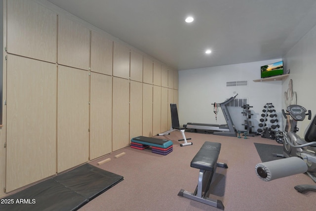 exercise room with carpet floors