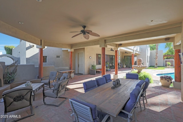 view of patio / terrace featuring ceiling fan