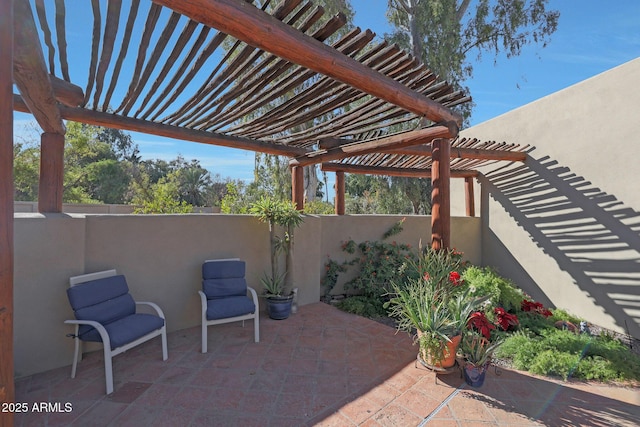 view of patio featuring a pergola