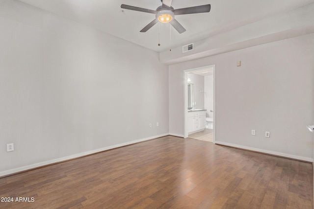 spare room featuring hardwood / wood-style flooring and ceiling fan