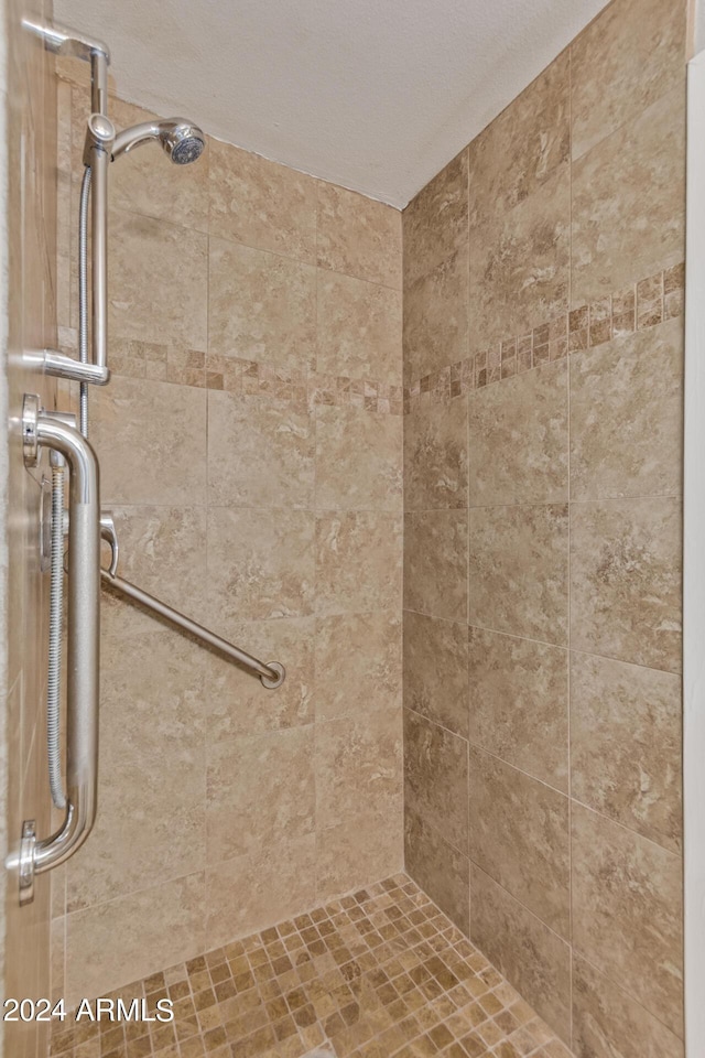 bathroom with tile patterned flooring, vanity, and toilet